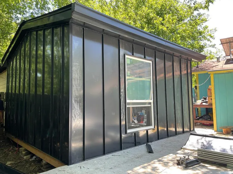 Black standing seam metal wall panels for Roof Inspection in Bellefontaine