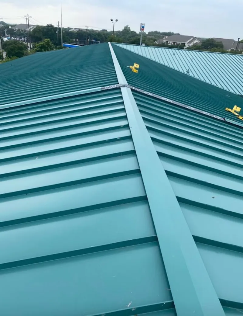 Green commercial metal roof ridge and valley for Metal Roof Repair in Bellefontaine