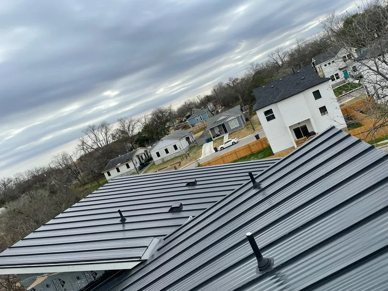 Standing seam metal roof panels with vents for Skylight Repair in Bellefontaine
